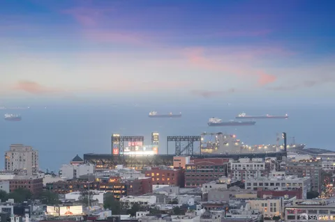 a view of a city with tall buildings