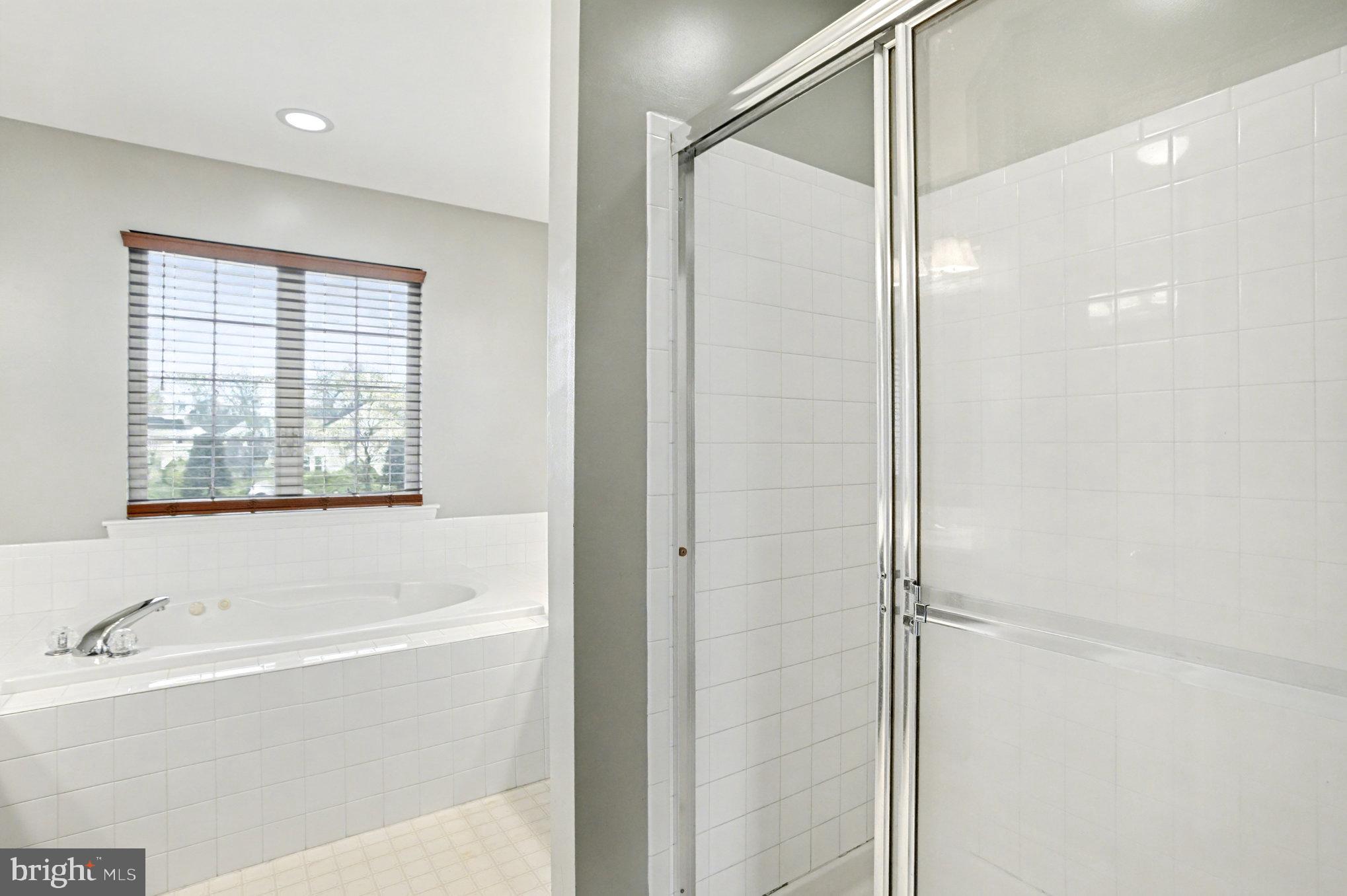 2935 Ancon Court Edgewood, MD 21040 - Photo 27 of 50 a bathroom with a bathtub and a shower