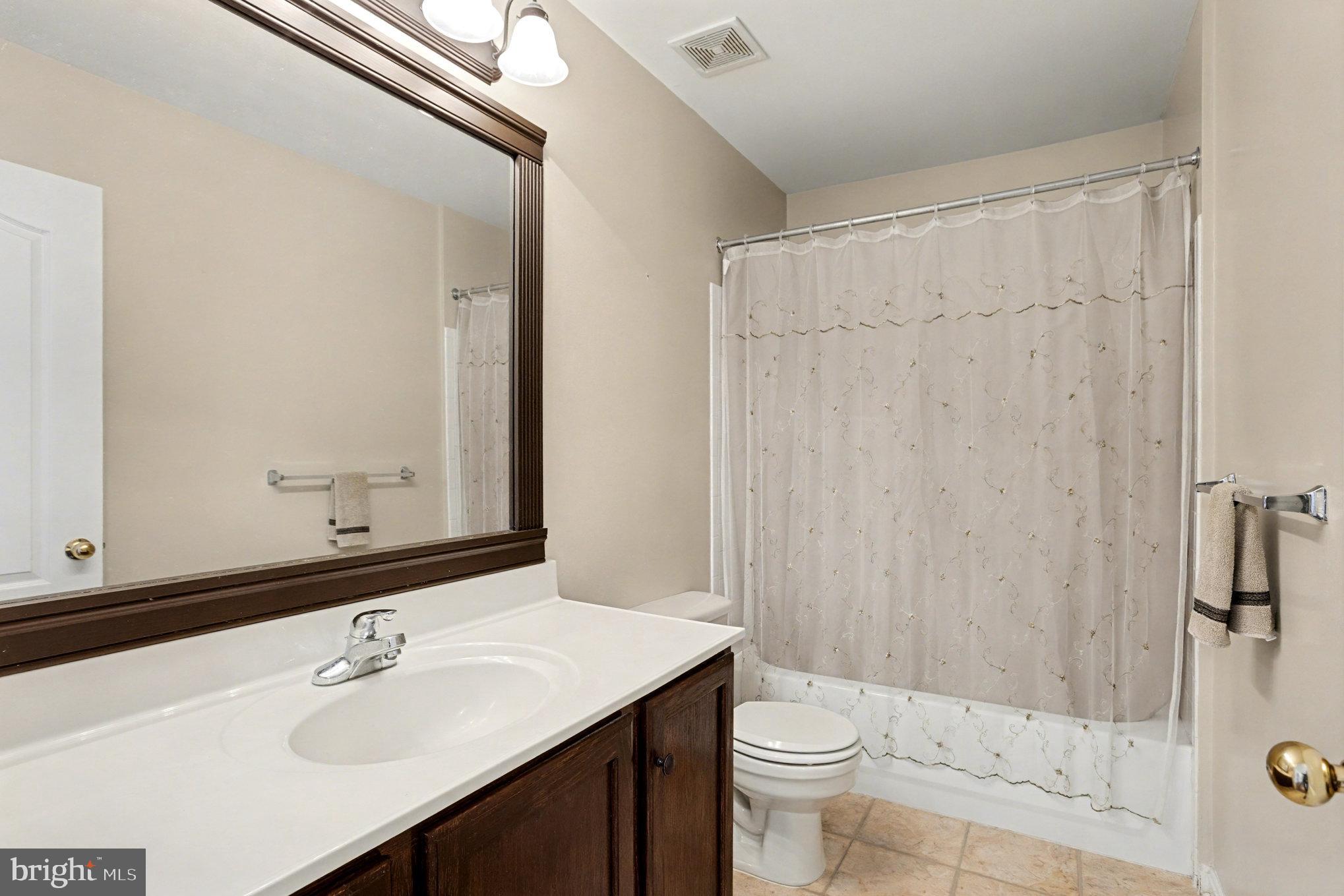 2935 Ancon Court Edgewood, MD 21040 - Photo 30 of 50 a bathroom with a sink a toilet and shower
