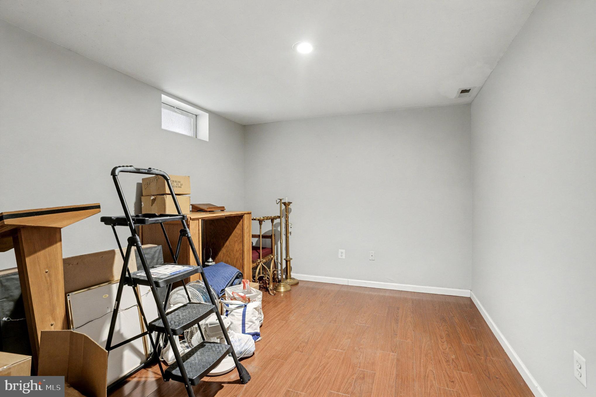 2935 Ancon Court Edgewood, MD 21040 - Photo 41 of 50 a view of a room with furniture and wooden floor