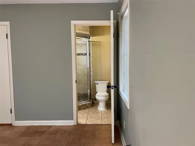 a bathroom with a toilet