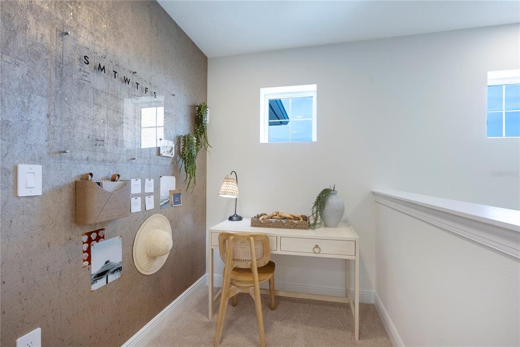 17841 Broadleaf Loop Venice, FL 34293 - Photo 18 of 19 a table and chairs in a room