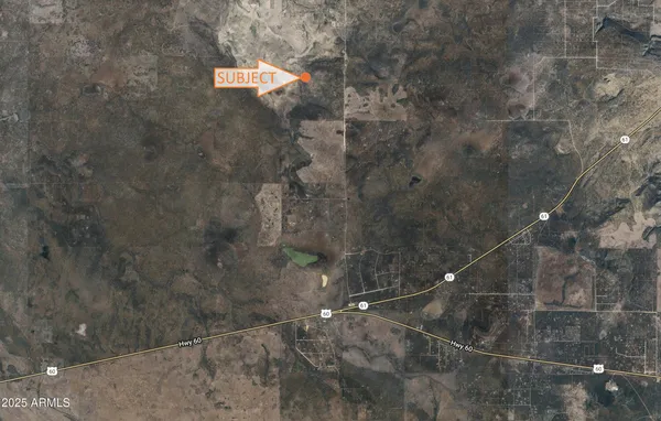 a street sign on a wall next to a bathroom