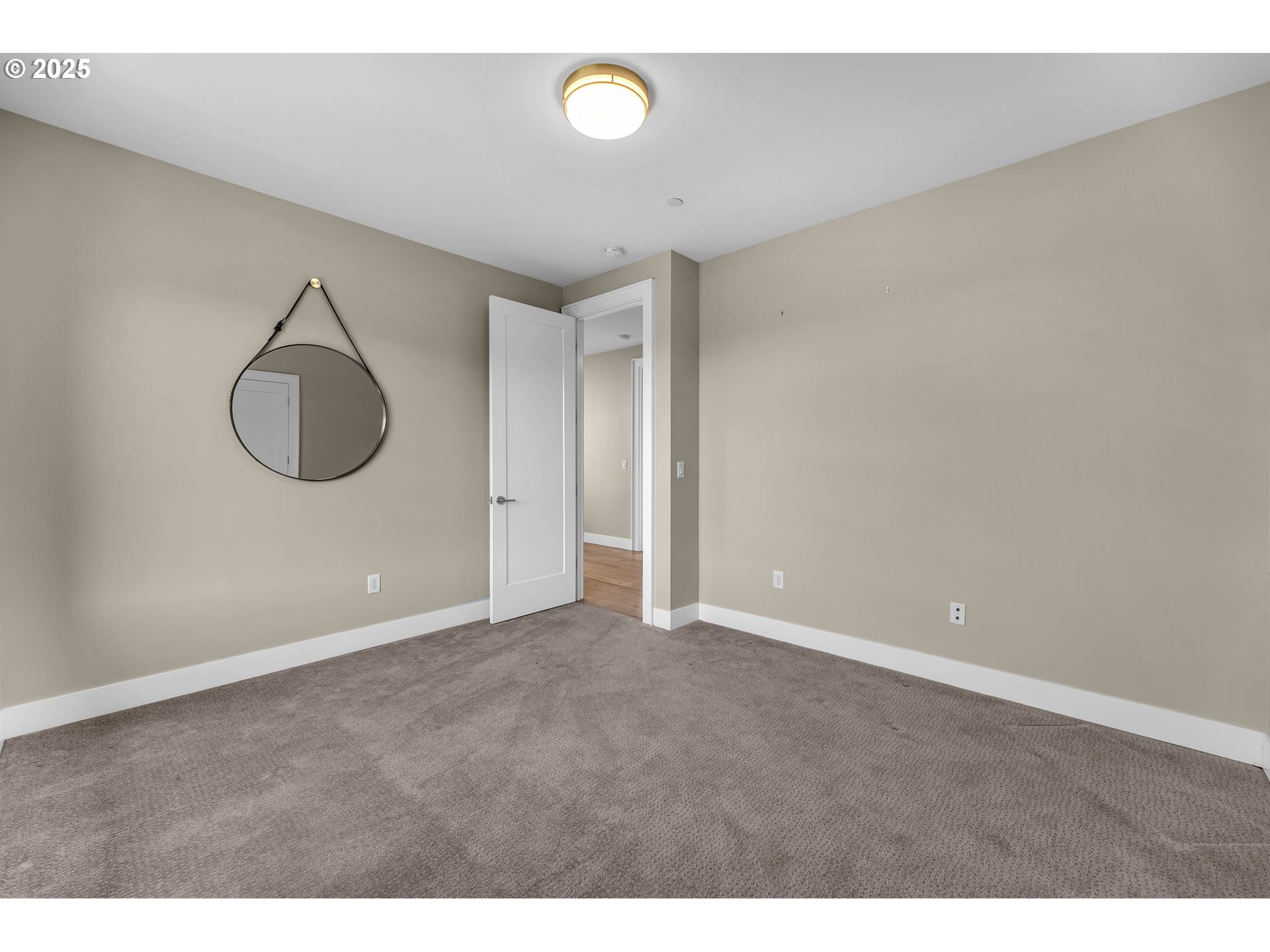 4645 North Adams Street Camas, WA 98607 - Photo 32 of 48 a view of an empty room with a window