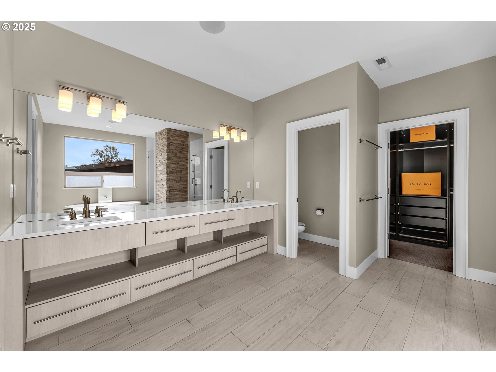 4645 North Adams Street Camas, WA 98607 - Photo 37 of 48 a bathroom with double vanity sink and mirror