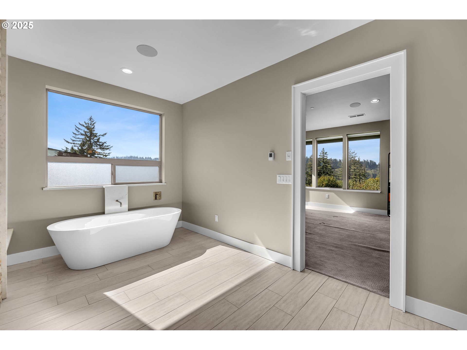 4645 North Adams Street Camas, WA 98607 - Photo 38 of 48 a living room with furniture and a painting on the wall