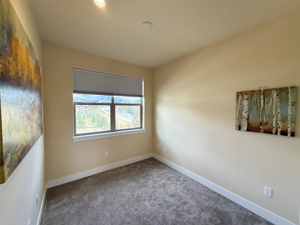 167 Wayback Drive, Unit 167 Keystone, CO 80435 - Photo 12 of 23 an empty room with windows