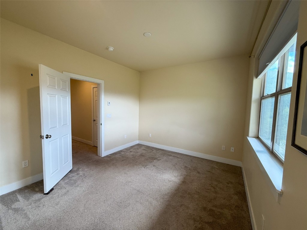 167 Wayback Drive, Unit 167 Keystone, CO 80435 - Photo 18 of 23 an empty room with windows