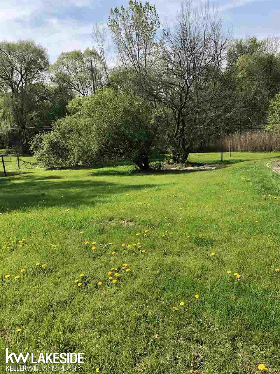 3415 West Auburn Road Rochester, MI 48309 - Photo 16 of 17 Sloping side yard