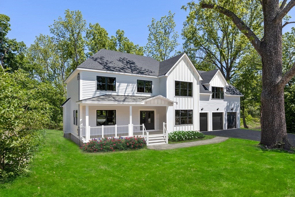 front view of a house with a yard
