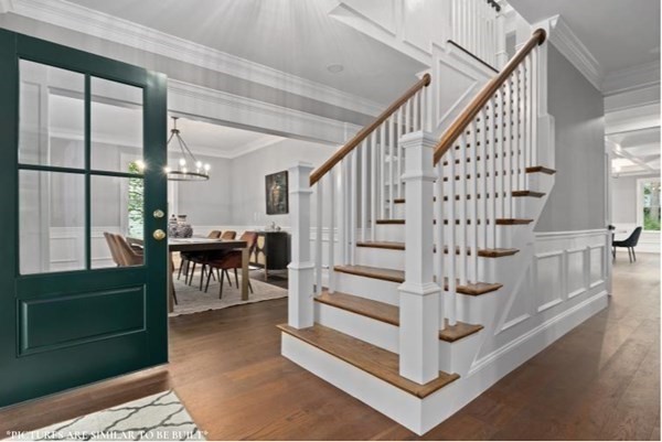 67 Everett Street Natick, MA 01760 - Photo 2 of 12 a view of entryway and hall with dining room