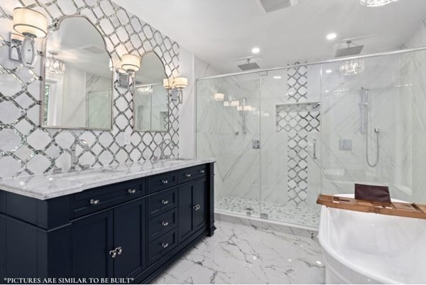 67 Everett Street Natick, MA 01760 - Photo 9 of 12 a bathroom with a sink and a mirror