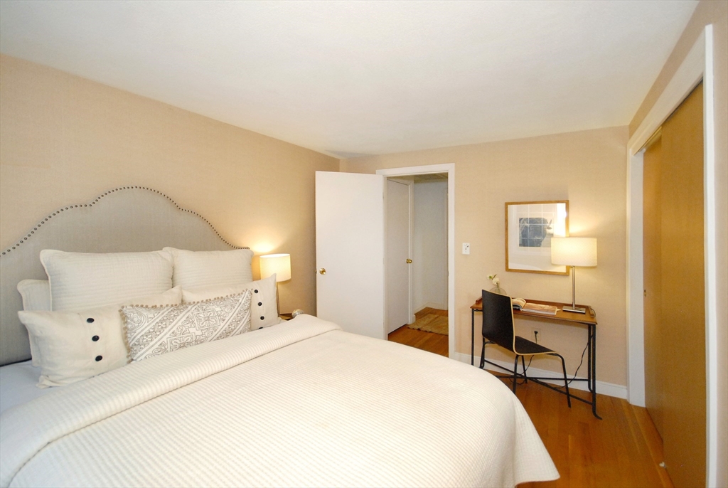 469 Hayward Mill Road Concord, MA 01742 - Photo 20 of 30 a bedroom with a bed and a desk