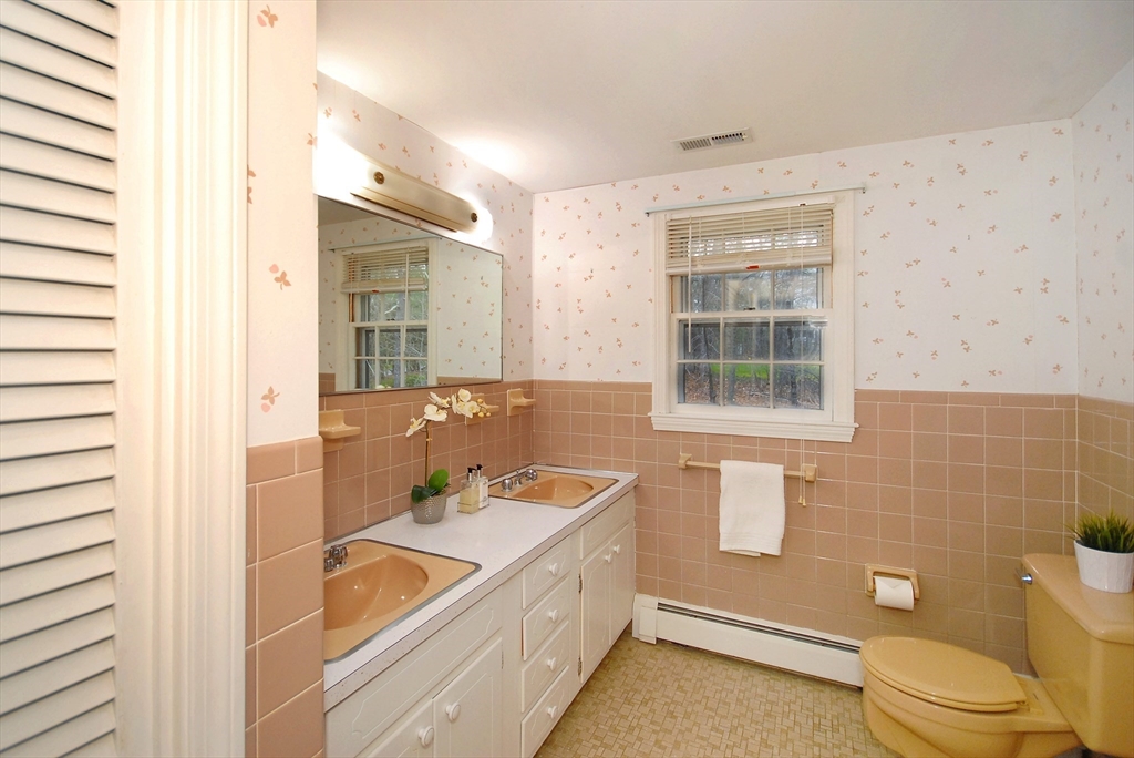 469 Hayward Mill Road Concord, MA 01742 - Photo 23 of 30 a bathroom with a granite countertop sink toilet and shower