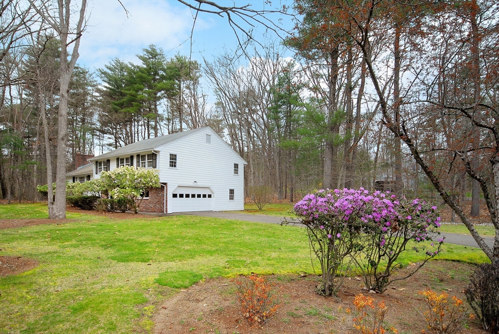 469 Hayward Mill Road Concord, MA 01742 - Photo 30 of 30 a front view of a house with garden