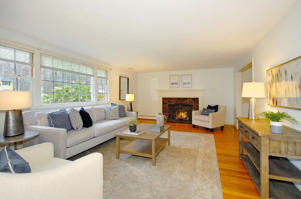 469 Hayward Mill Road Concord, MA 01742 - Photo 3 of 30 a living room with furniture and a fireplace