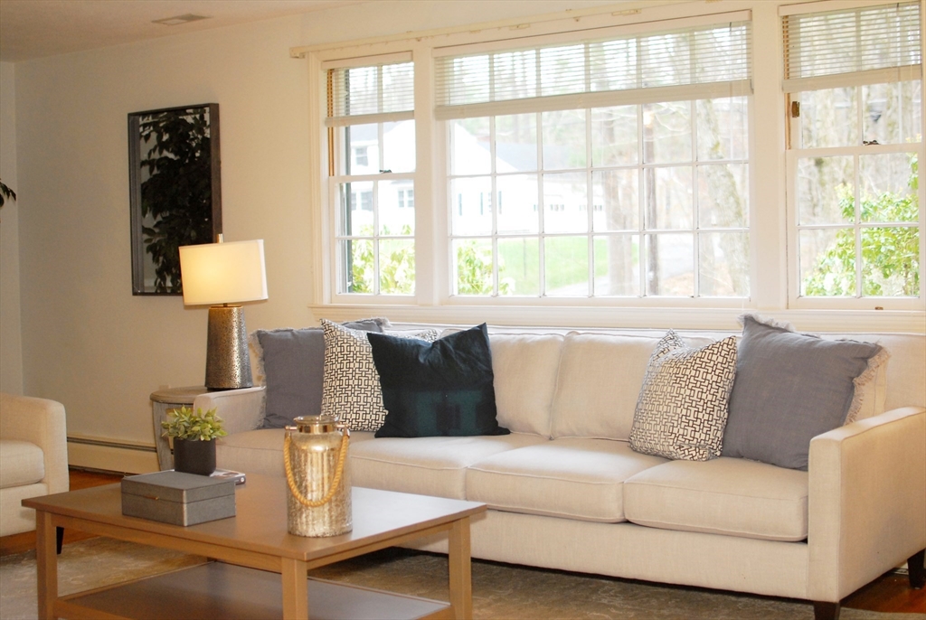 469 Hayward Mill Road Concord, MA 01742 - Photo 4 of 30 a living room with furniture and a large window