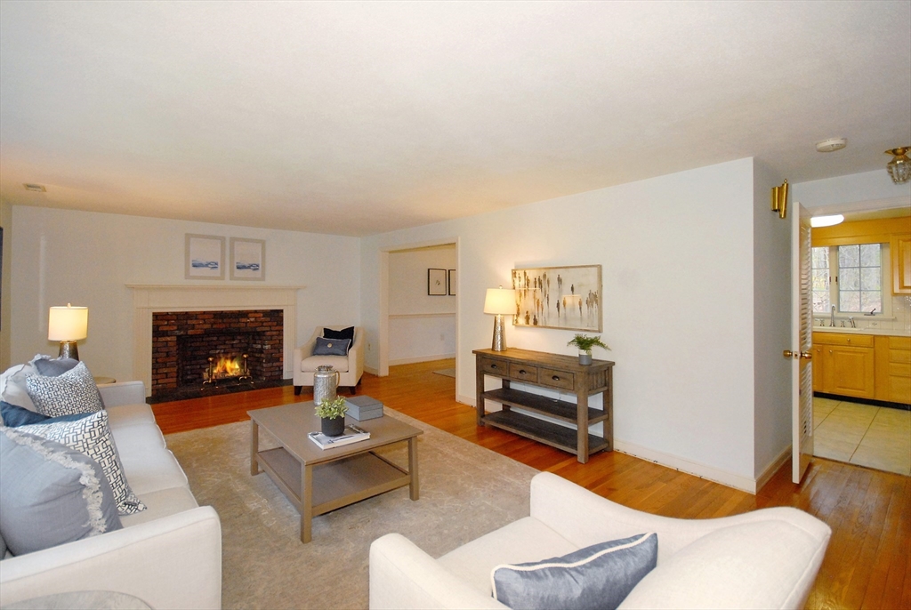 469 Hayward Mill Road Concord, MA 01742 - Photo 5 of 30 a living room with furniture and a fireplace