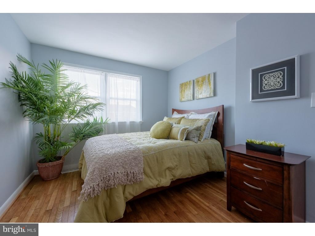 2218 Graythorn Road Middle River, MD 21220 - Photo 22 of 30 a bed sitting in a bedroom next to a window