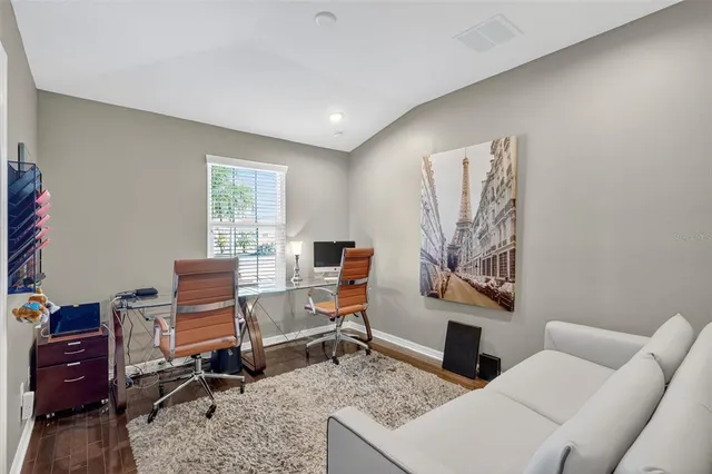 a workspace with furniture and a window