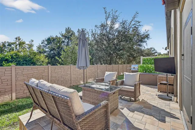 a view of a patio on the roof deck