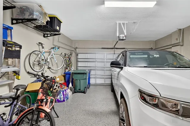 a view of a storage room with a table and chairs