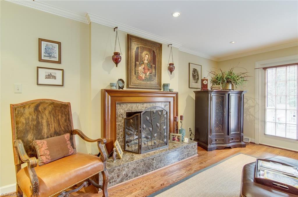 1301 Georgetown Court High Point, NC 27262 - Photo 3 of 29 Den has hardwood floors and spacious to accommodate your family