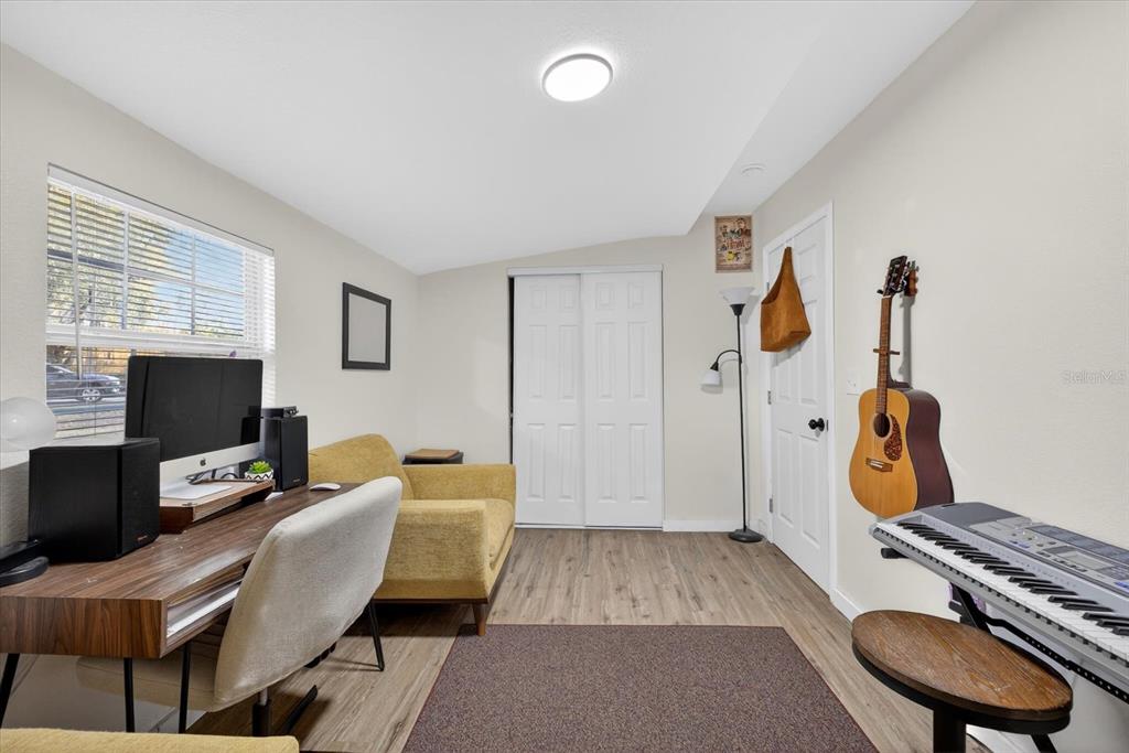 4233 Vinson Road Lakeland, FL 33810 - Photo 21 of 38 a room with furniture and a flat screen tv