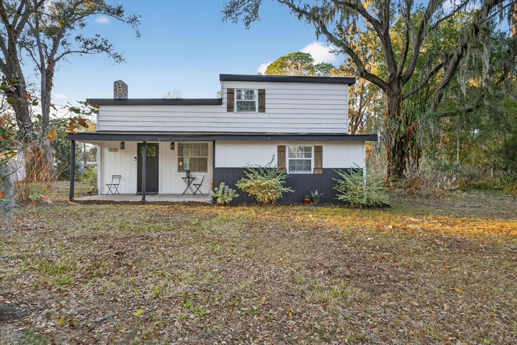4233 Vinson Road Lakeland, FL 33810 - Photo 29 of 38 a view of a house with a yard