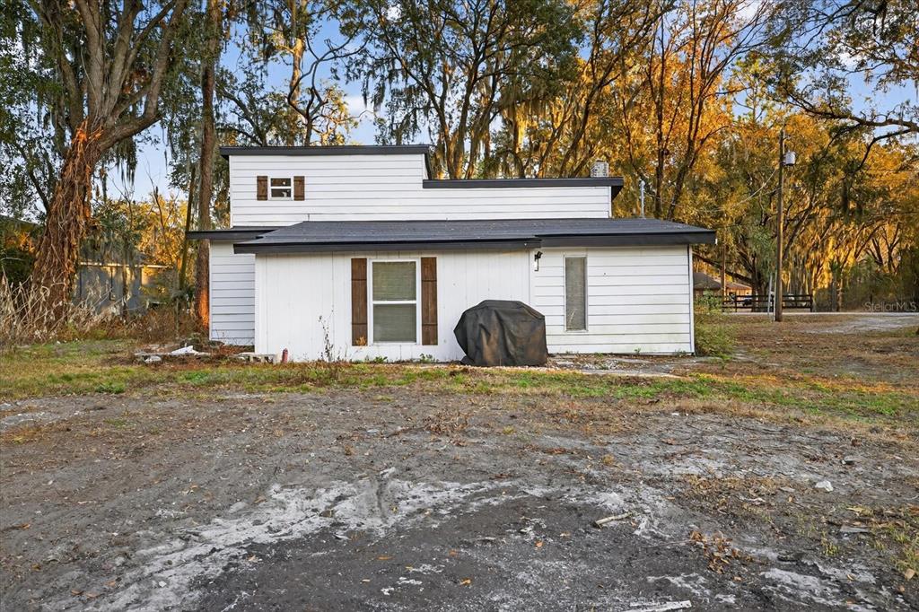 4233 Vinson Road Lakeland, FL 33810 - Photo 30 of 38 a house that has a tree in front of it