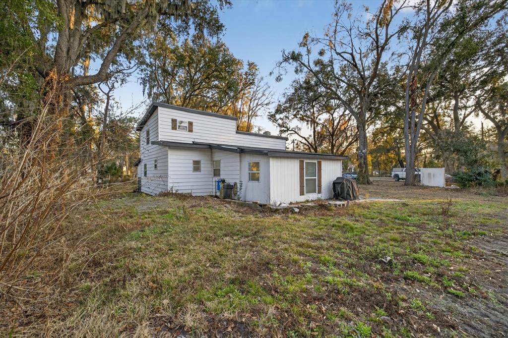 4233 Vinson Road Lakeland, FL 33810 - Photo 34 of 38 a view of a house with a yard
