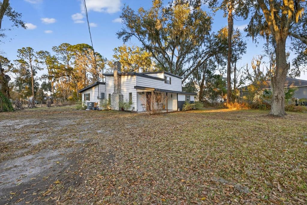 4233 Vinson Road Lakeland, FL 33810 - Photo 35 of 38 a front view of a house with a yard