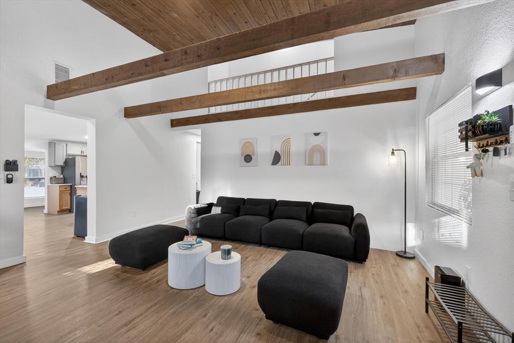 4233 Vinson Road Lakeland, FL 33810 - Photo 5 of 38 a living room with furniture and a wooden floor