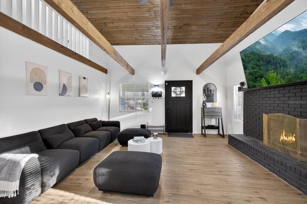 4233 Vinson Road Lakeland, FL 33810 - Photo 6 of 38 a living room with furniture and a fireplace