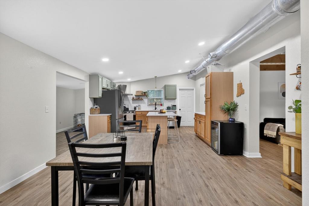 4233 Vinson Road Lakeland, FL 33810 - Photo 8 of 38 a living room with lots of furniture and kitchen view