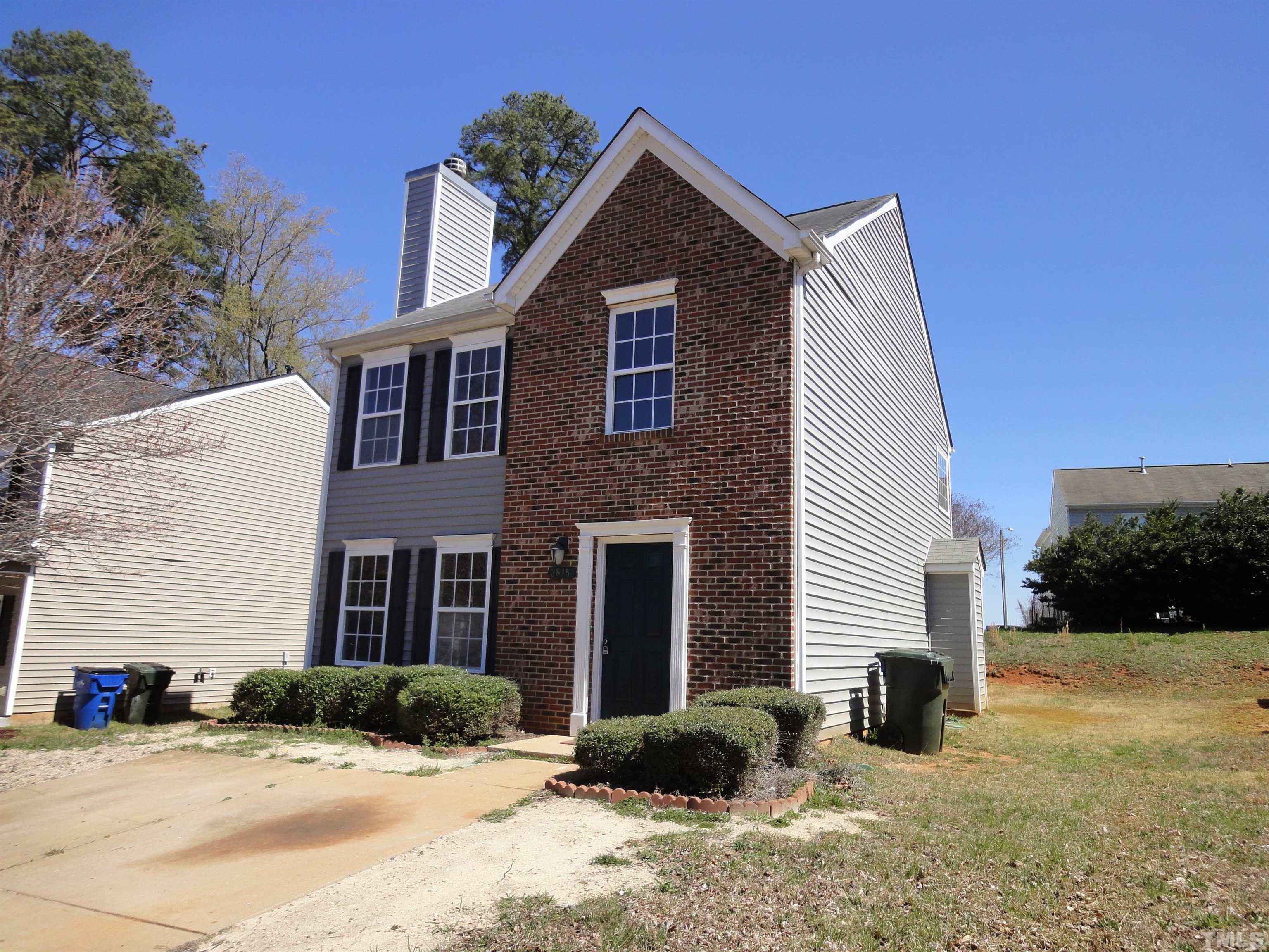 3615 Cyrus Street Raleigh, NC 27610 - Photo 2 of 36 a front view of a house with a yard
