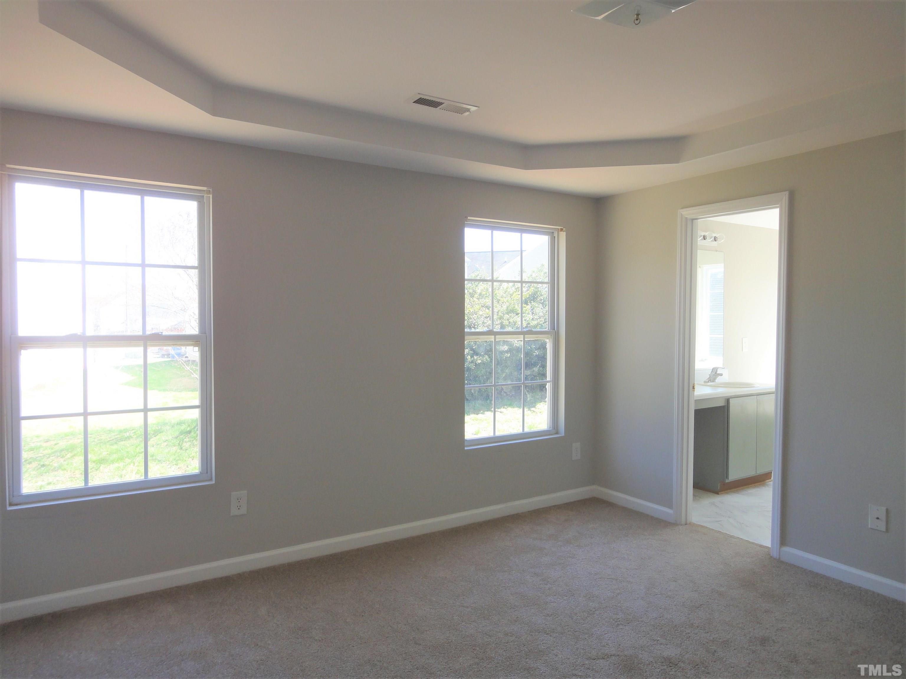 3615 Cyrus Street Raleigh, NC 27610 - Photo 21 of 36 an empty room with a window