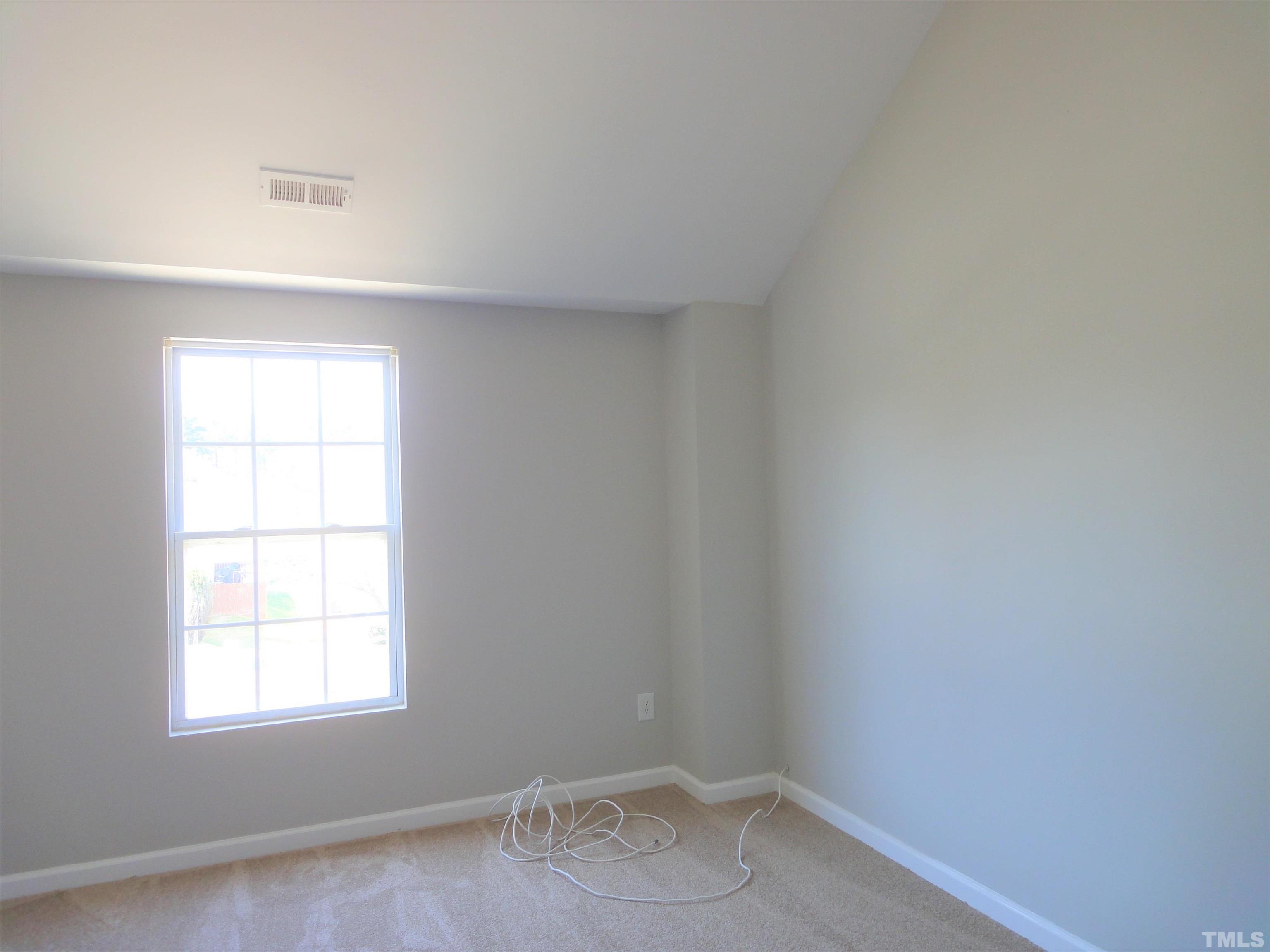 3615 Cyrus Street Raleigh, NC 27610 - Photo 24 of 36 an empty room with a window