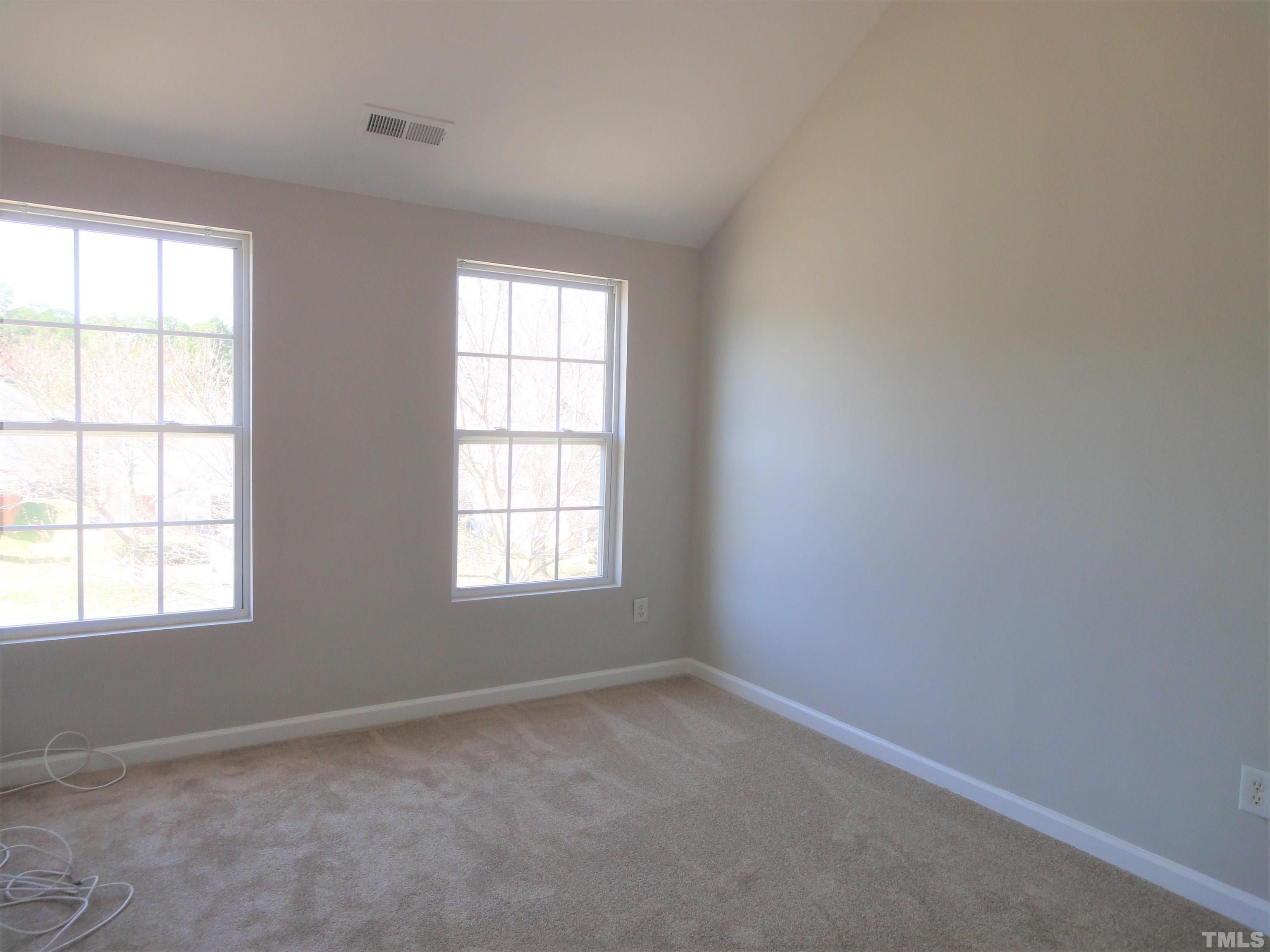 3615 Cyrus Street Raleigh, NC 27610 - Photo 27 of 36 an empty room with a window