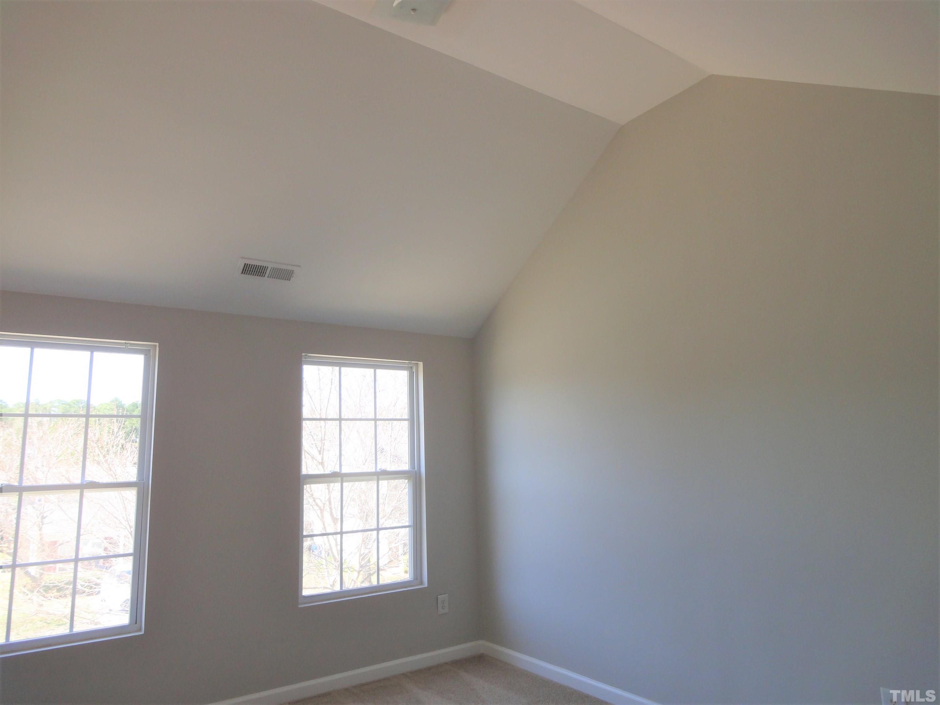 3615 Cyrus Street Raleigh, NC 27610 - Photo 28 of 36 an empty room with windows