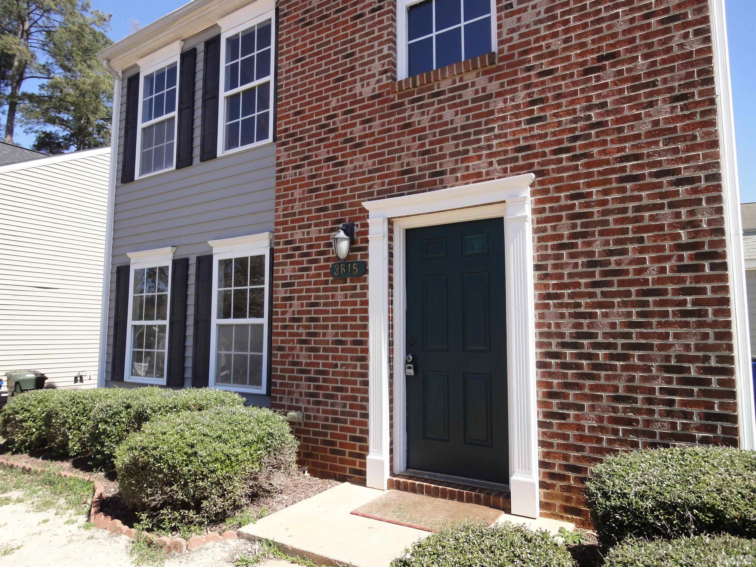 3615 Cyrus Street Raleigh, NC 27610 - Photo 3 of 36 a brick house with a large windows