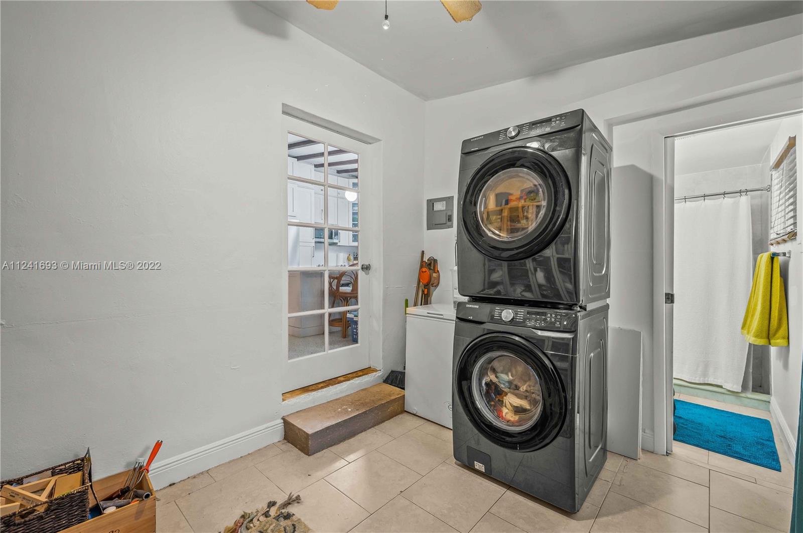 6730 Southwest 32nd Street Miami, FL 33155 - Photo 21 of 31 a view of livingroom with washer and dryer