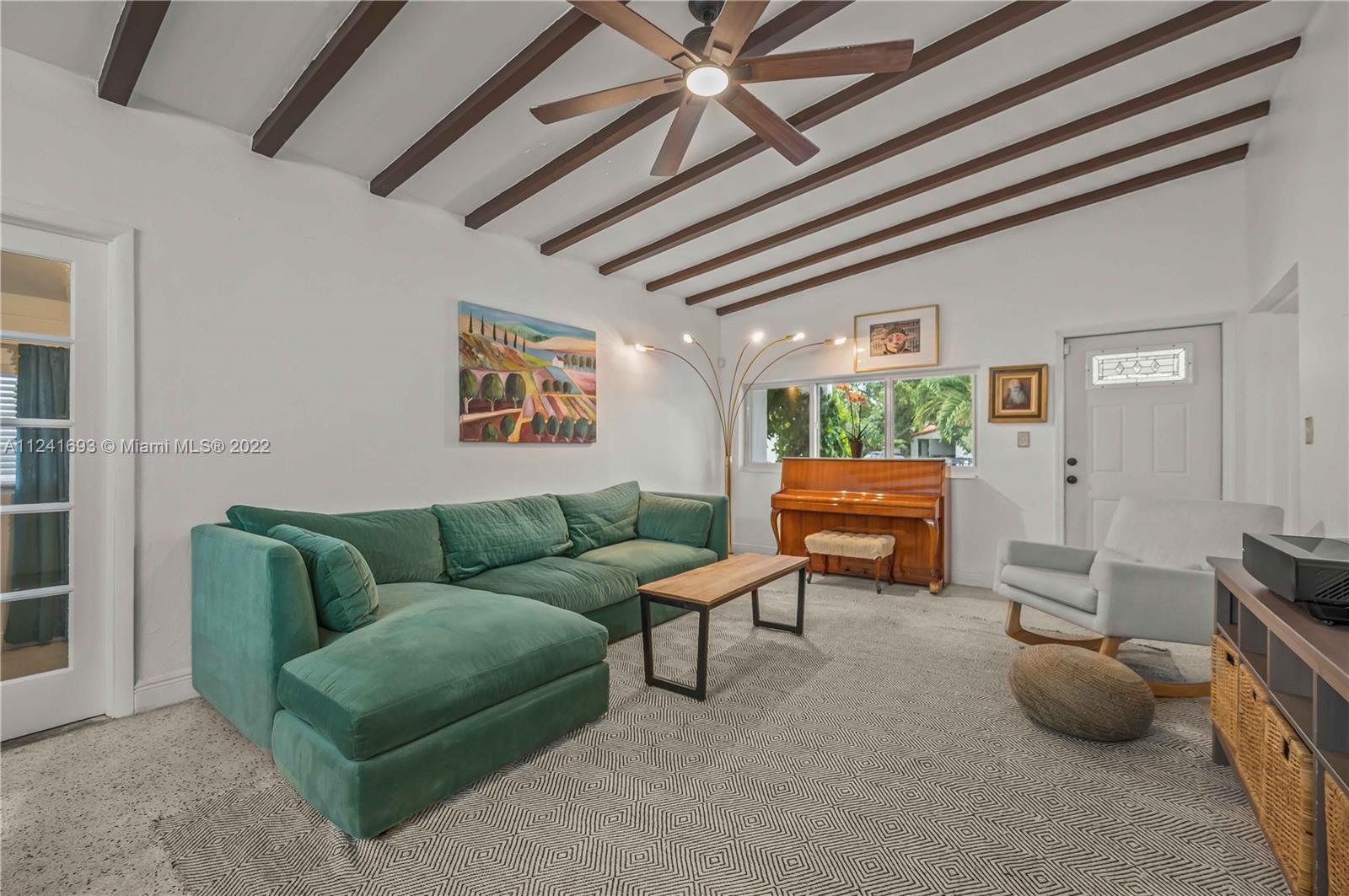 6730 Southwest 32nd Street Miami, FL 33155 - Photo 5 of 31 a living room with furniture and a wooden floor