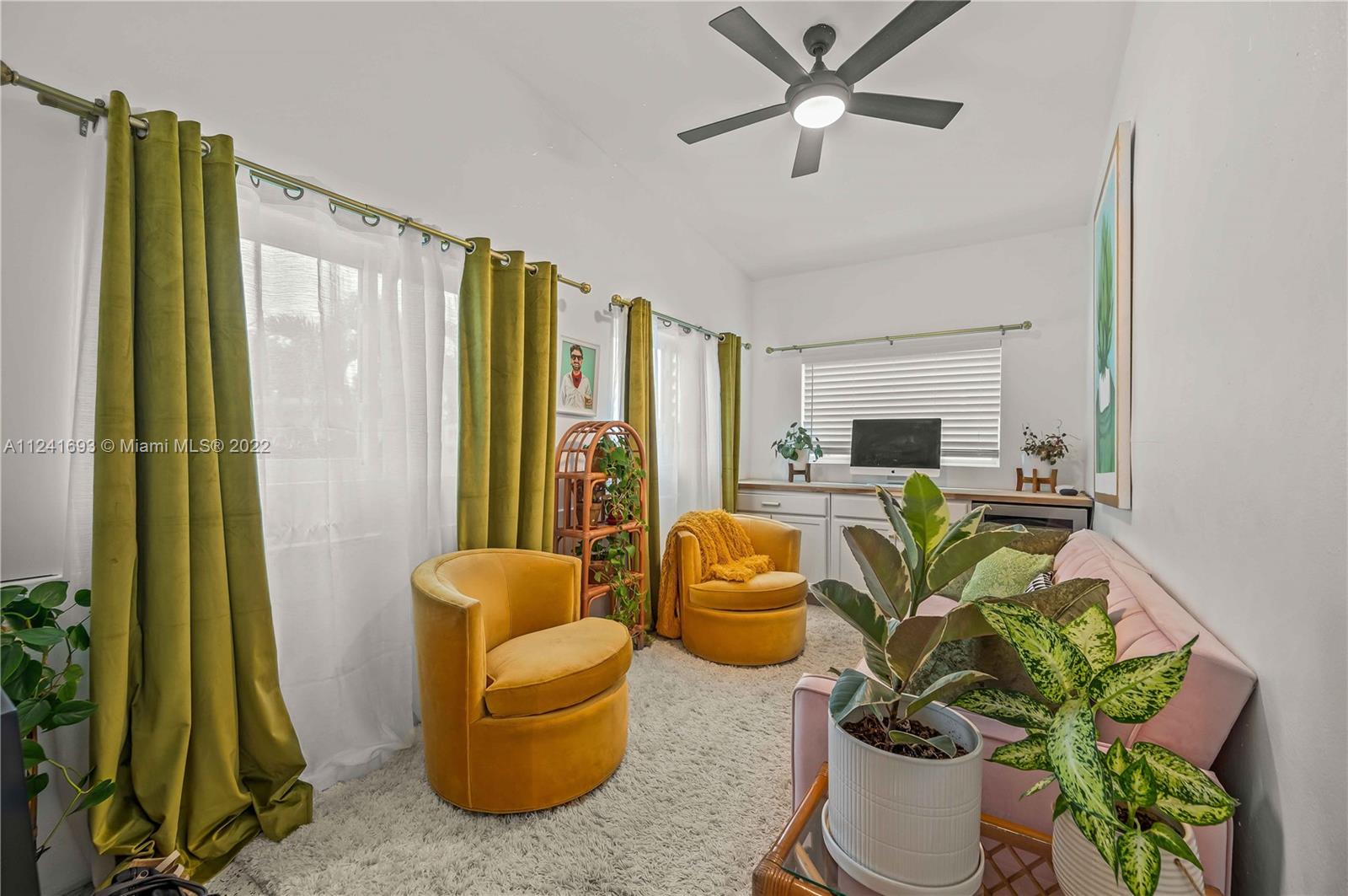 6730 Southwest 32nd Street Miami, FL 33155 - Photo 9 of 31 a living room with furniture and a large window