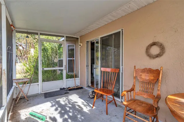 a balcony with chairs