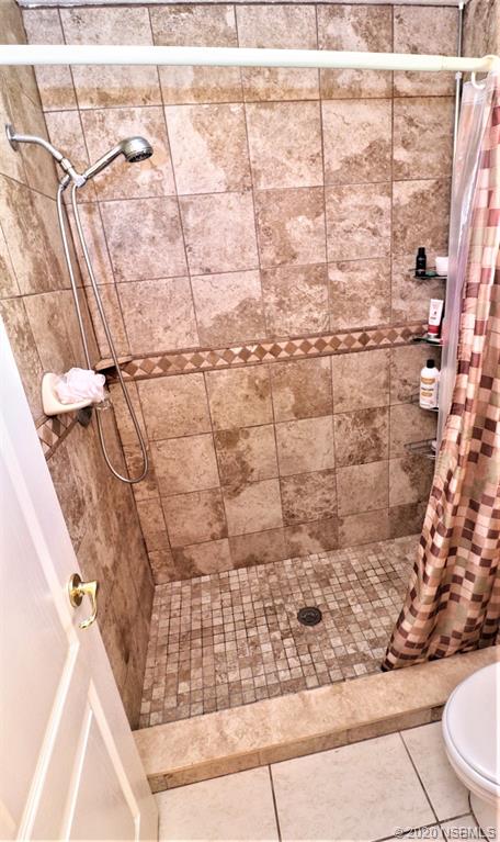 3316 Mango Tree Drive Edgewater, FL 32141 - Photo 17 of 28 a bathroom with a shower