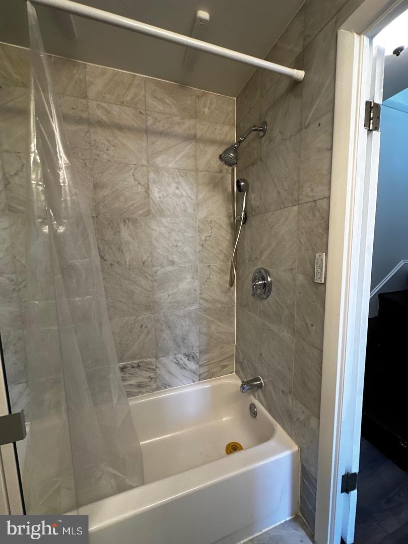 810 South Howard Street Philadelphia, PA 19147 - Photo 14 of 21 a bathroom with a bathtub and a shower