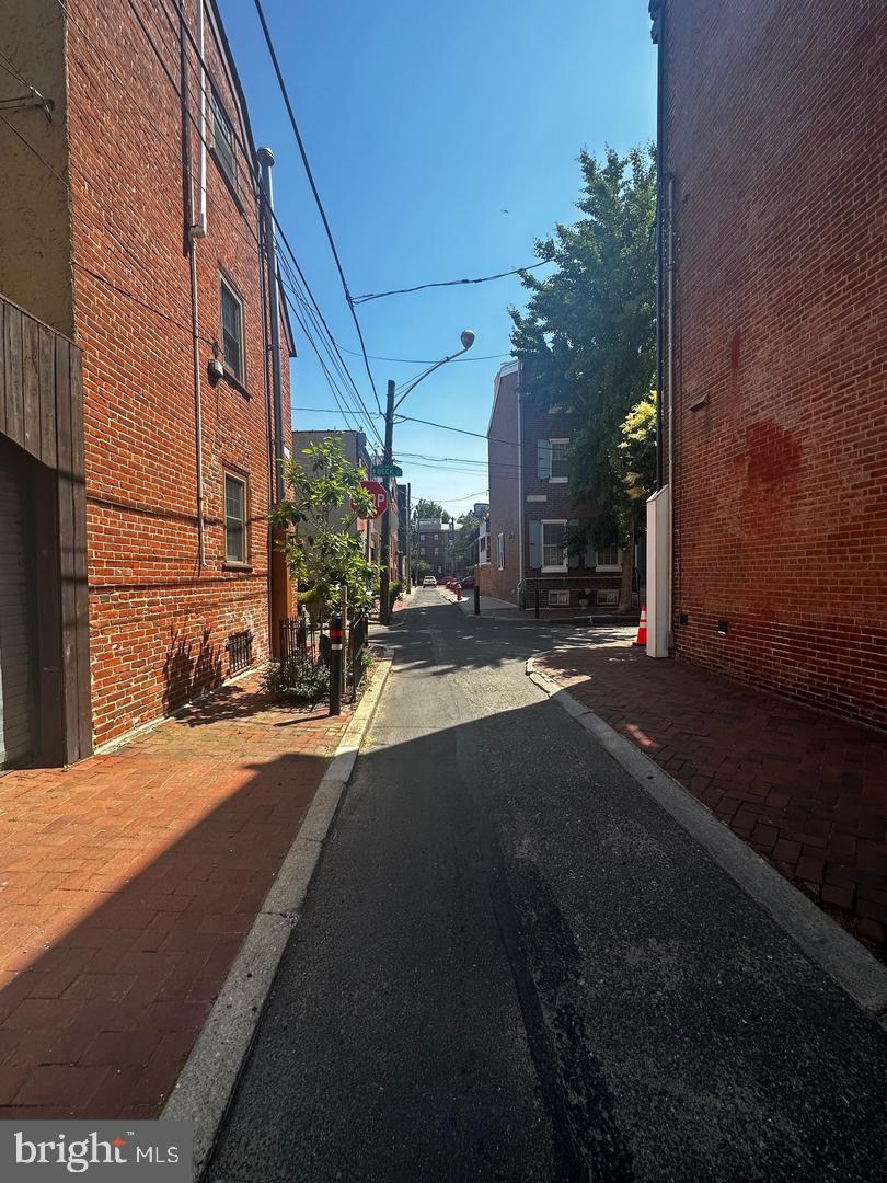 810 South Howard Street Philadelphia, PA 19147 - Photo 3 of 21 a view of a brick building next to a yard