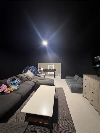 a bed room with two bed and a night stand