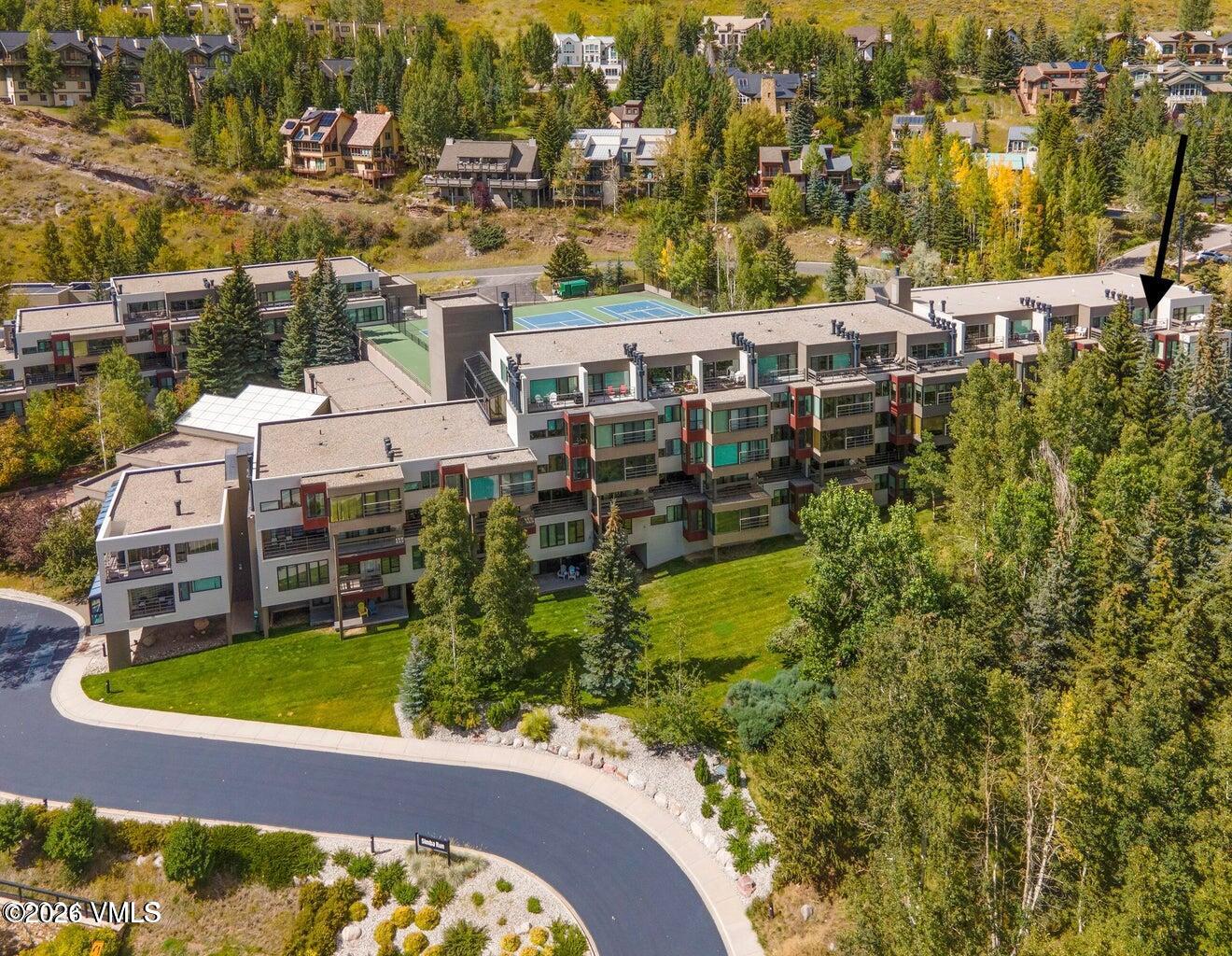 1100 North Frontage Road West, Unit 1519 Vail, CO 81657 - Photo 1 of 38 a view of a swimming pool with outdoor seating